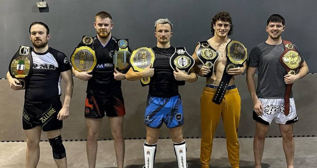 OMMA champions with belts